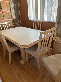 7 foot table and 5 chairs