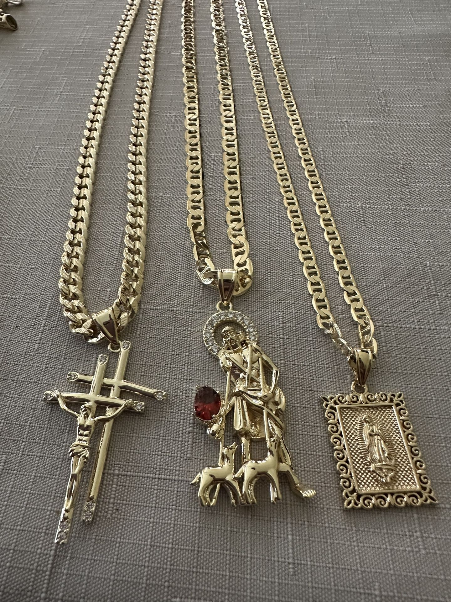 1 Cuban Chain In Gold Plated And 2 Gold Filled Chain With San Lazaro And Square Virgin Pendant