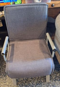 Chair turns into bed