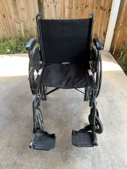 Black Folding Wheelchair with Footrests