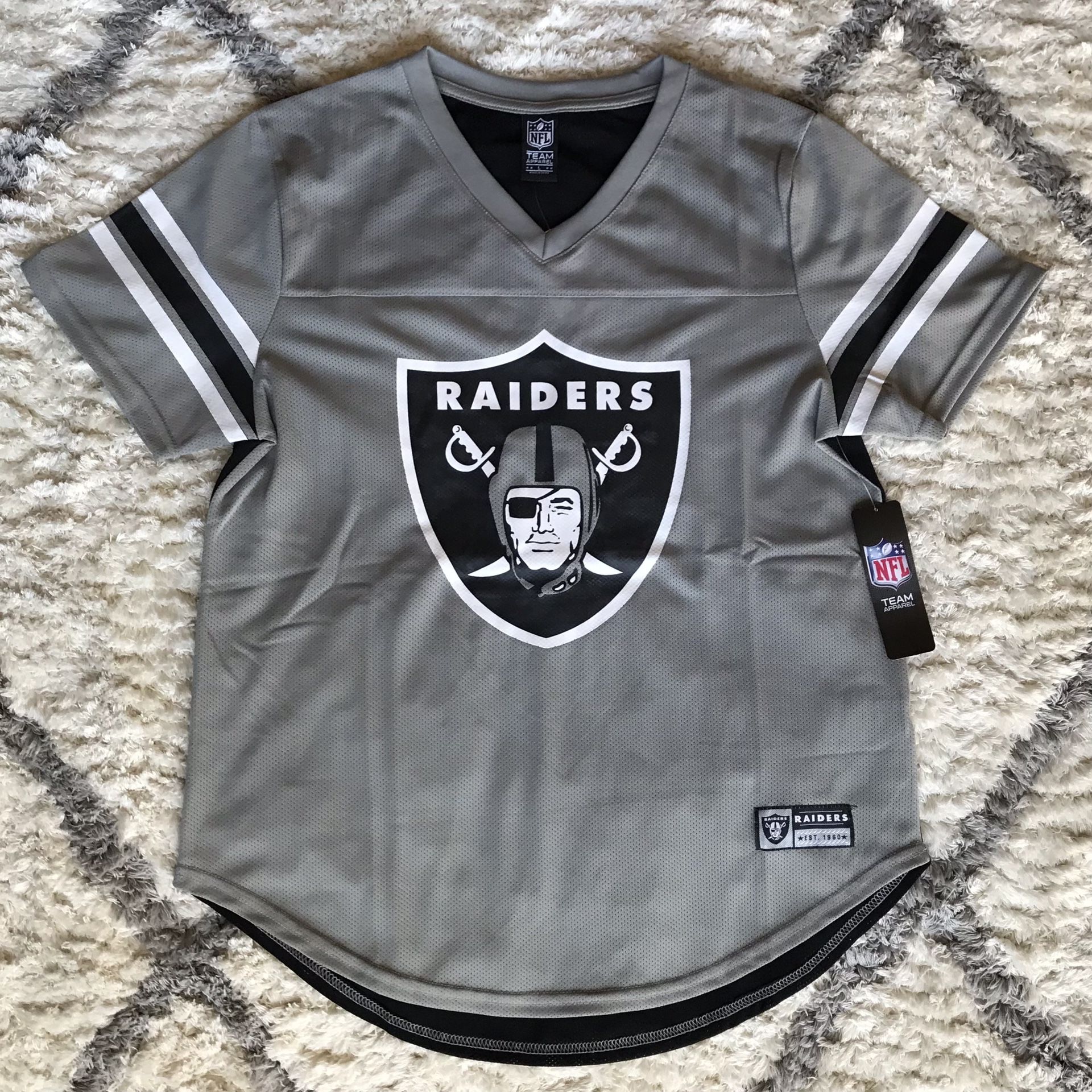 Raiders Women’s Jersey, Size XL.