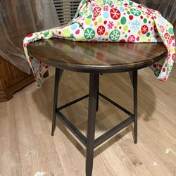 Bar height table and 4 swivel chairs