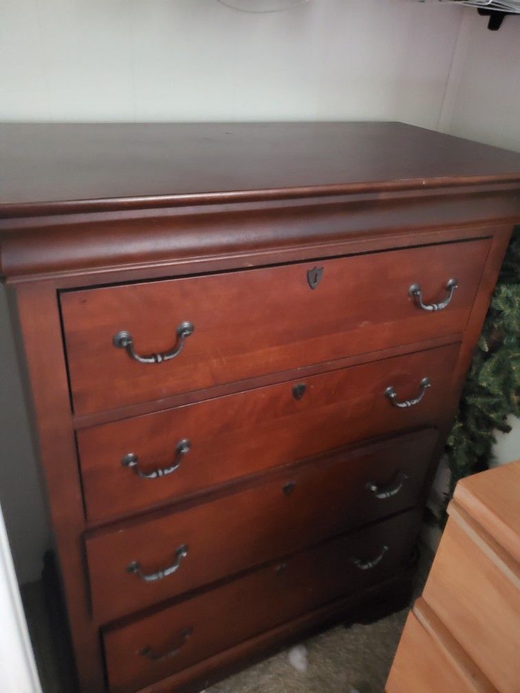 tall dark wood dresser