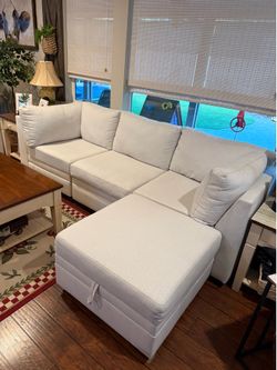 2 identical cream couches separate or together