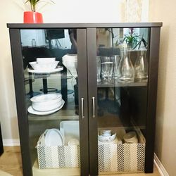 Stylish, contemporary hutch, spacious, glass doors and cabinet. Sleek. Espresso finish. $70 each or $120 for both. The cabinet measurements are  width
