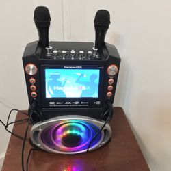 KARAOKE USA GF846 DVD/CD+G/MP3+G Bluetooth(R) Karaoke System with 7" TFT Color Screen & LED Sync Light. Two 🎤 