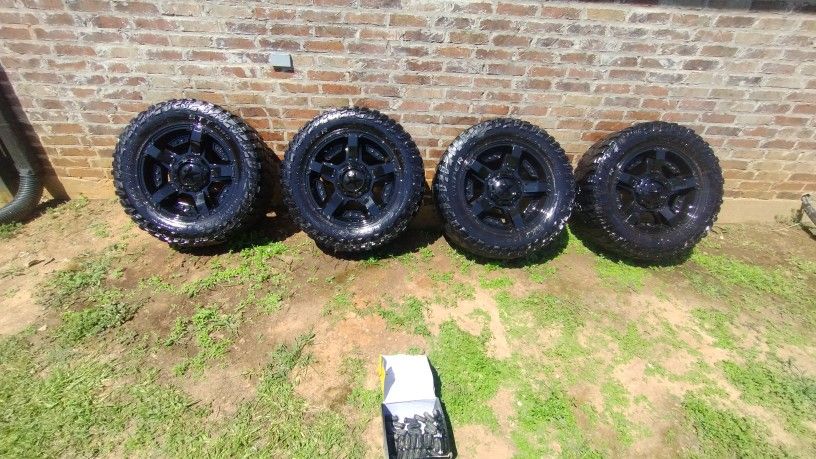 DODGE 8 LUG WHEELS AND TIRES FOR SALE