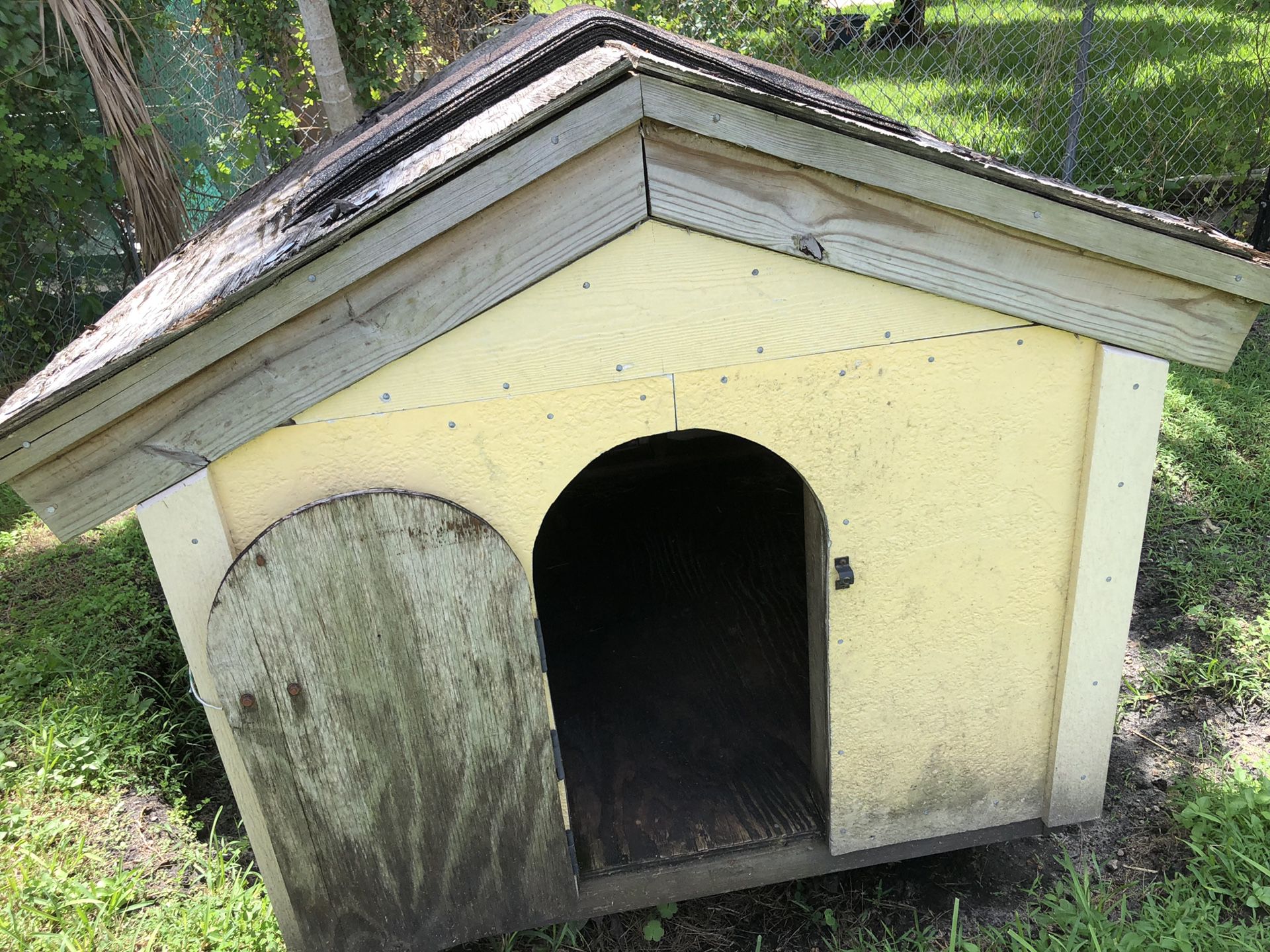 I had this house built for my dog the Roof needs to be fix but it does not get wet inside the house has front door & back door it is a big house for.
