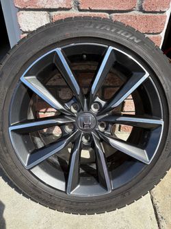 17-inch factory OEM alloy wheel from a 2021–2022 Honda Accord with a charcoal and machined finish.