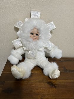 Vintage Snowflake Plush Singing Doll