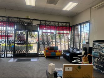 Heavy-Duty  Retractable Security Cage / Storefront Security Gate – Customizable