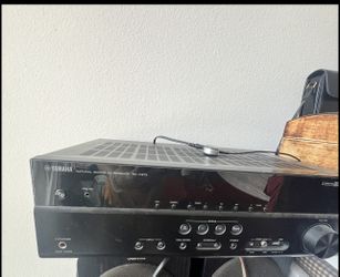 This item is a Yamaha Natural Sound AV Receiver RX-V373. Key features include: 5.1 channel surround sound capability with 100W per channel.