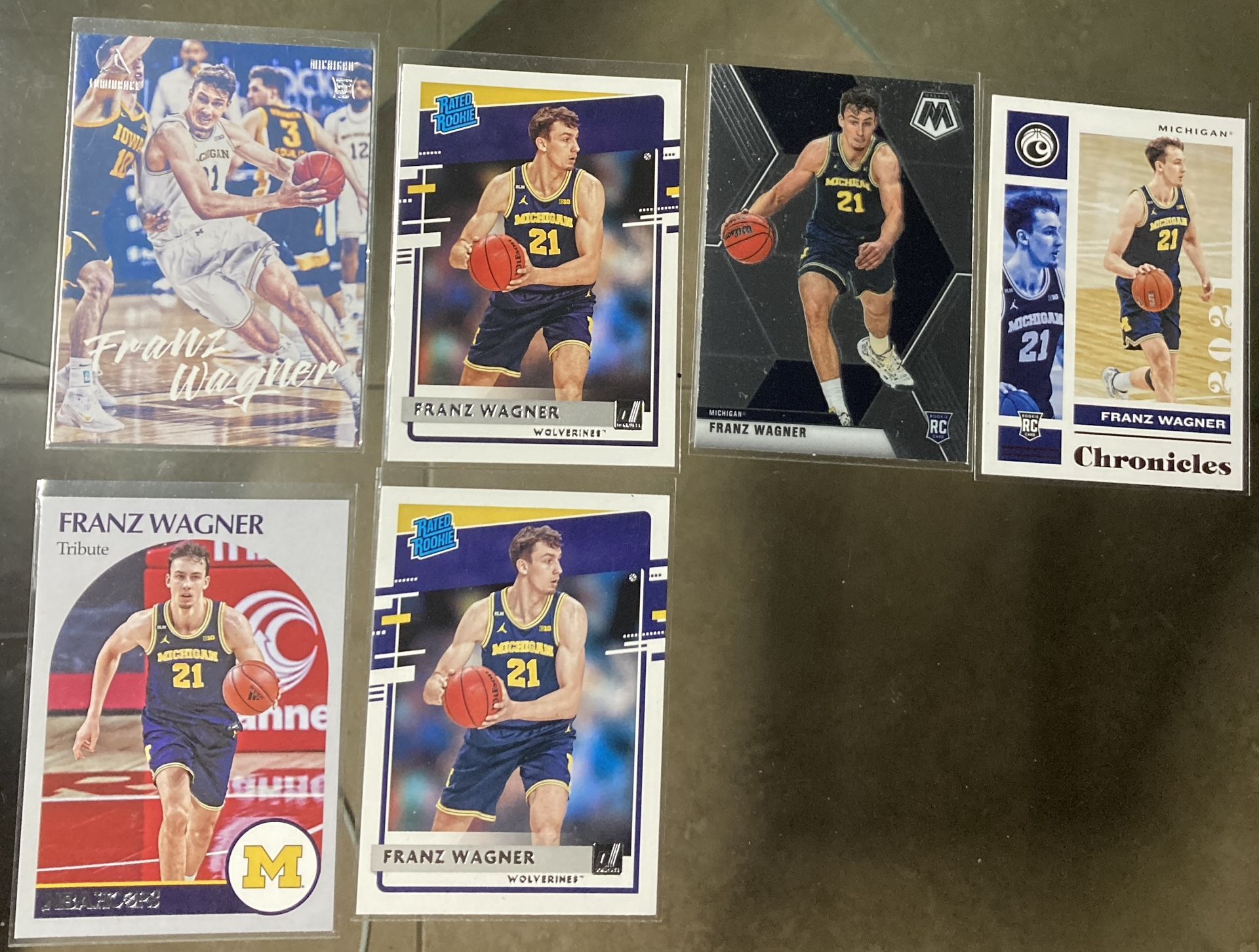 6 card NBA basketball card Franz Wagner lot Optic Donruss Chronicles Hoops Etc All cards are In good condition near mint to mint - gem.