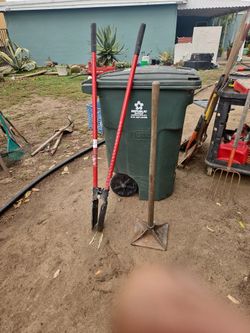 Post hole digger/soil compactor