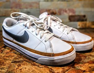 Nike Women's Court Legacy Leather Sneaker Synthetic Leather Upper In A Lifestyle Sneaker Style With A Round Toe • Lace-Up Closure With Metal Eyelets •