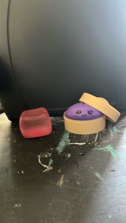 Pink needoh and a purple dumpling