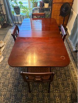 Solid mahogany table/ four chairs