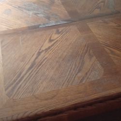 Dining table in five chairs plus a center leaf