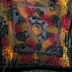 burnout velvet shawl (also known as devoré),which features a decorative floral pattern 