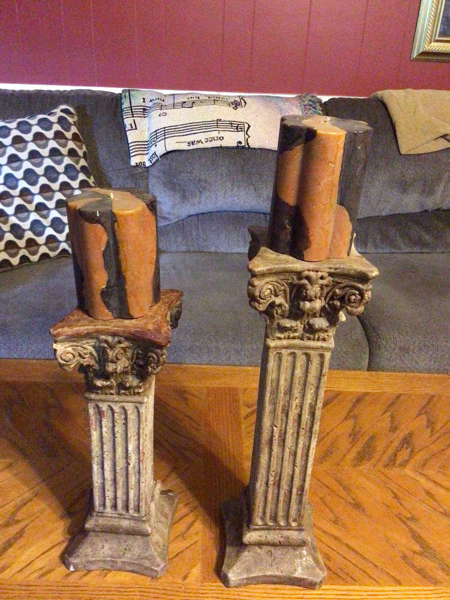Two beautiful pedestal candleholders with candles, like new