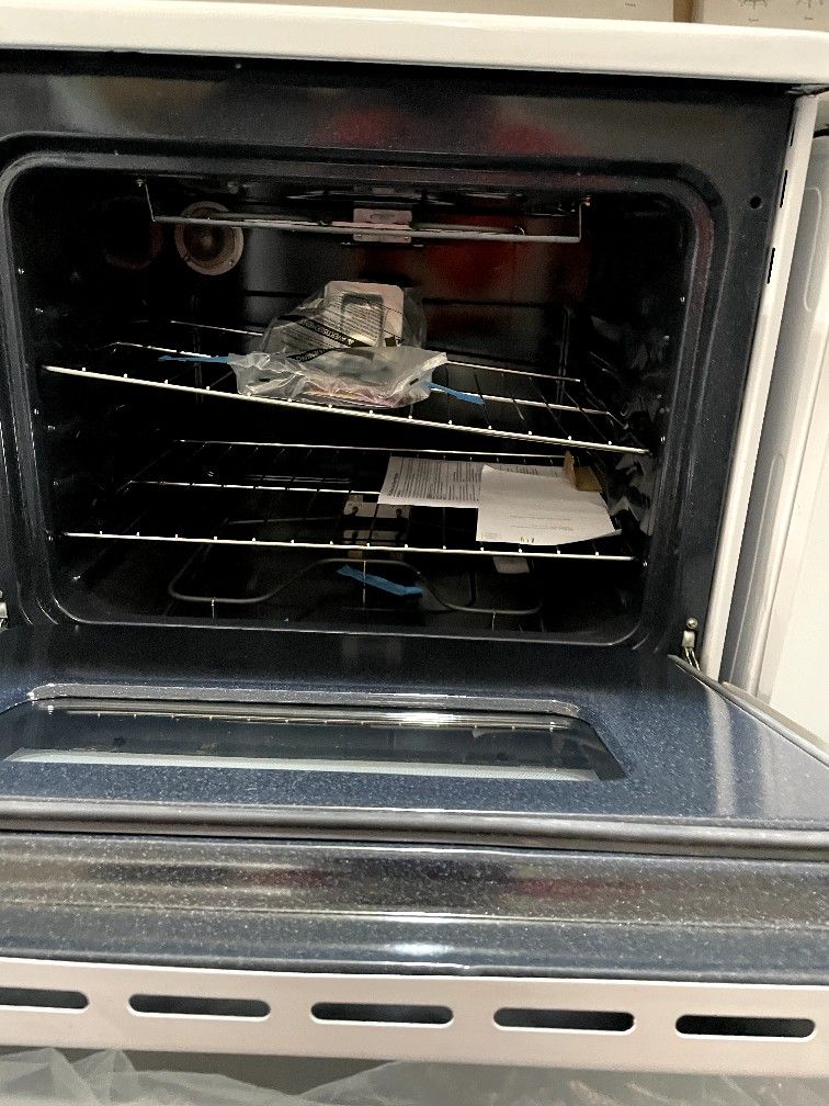 GE 30” electric stove with coils white DENTED 225 for Sale in Medley