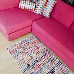 IKEA Hot Pink Sleeper Storage Couch.