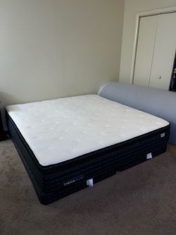 King size mattress barely used asking $250 Therapedic