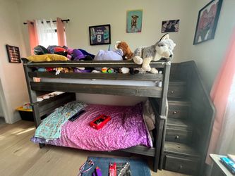Twin bunk bed with stairs and storage