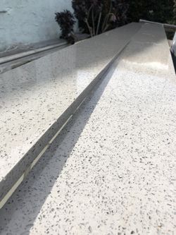 Sparkling gray quartz granite backsplash