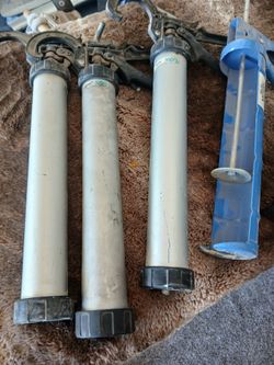 5 commercial caulking guns working