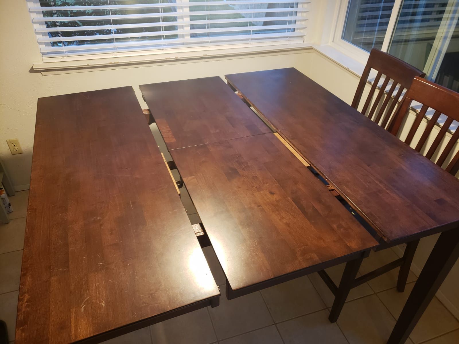 Expanding Rectangular wood table with chairs