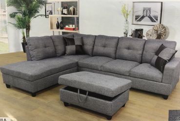 GREY FABRIC SECTIONAL SOFA WITH STORAGE OTTOMAN NEW IN BOX