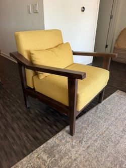 Comfortable Yellow Chair with wooden Frame