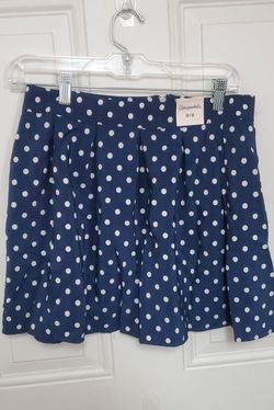 Navy blue and white polka dot mini skirt with zipper closure 