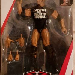 New WWE Elite Collection The Rock Action Figure.