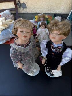 Beauiful doll porcelain with stand both for $60