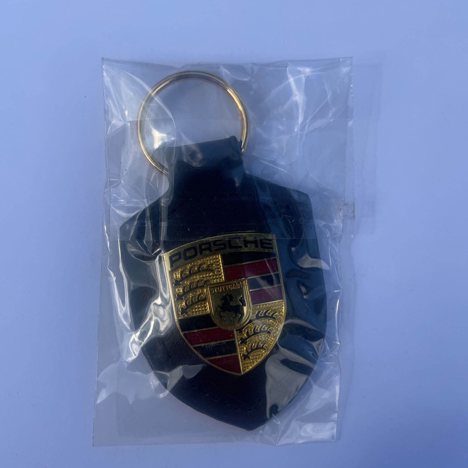 Porsche black leather “New” key ring