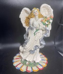 Decorative Angel Figurine Holding Flowers 9”