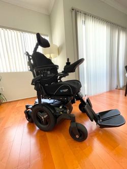 Like New PERMOBIL M1 WHEELCHAIR WITH POWER TILT, LEGRESTS