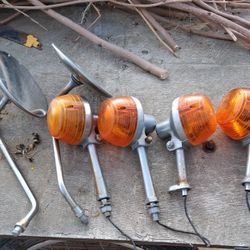 turn signal blinkers and mirrors, specifically identified as Honda CB750 Four H1409 Turn Signal Blinker Assy Set 