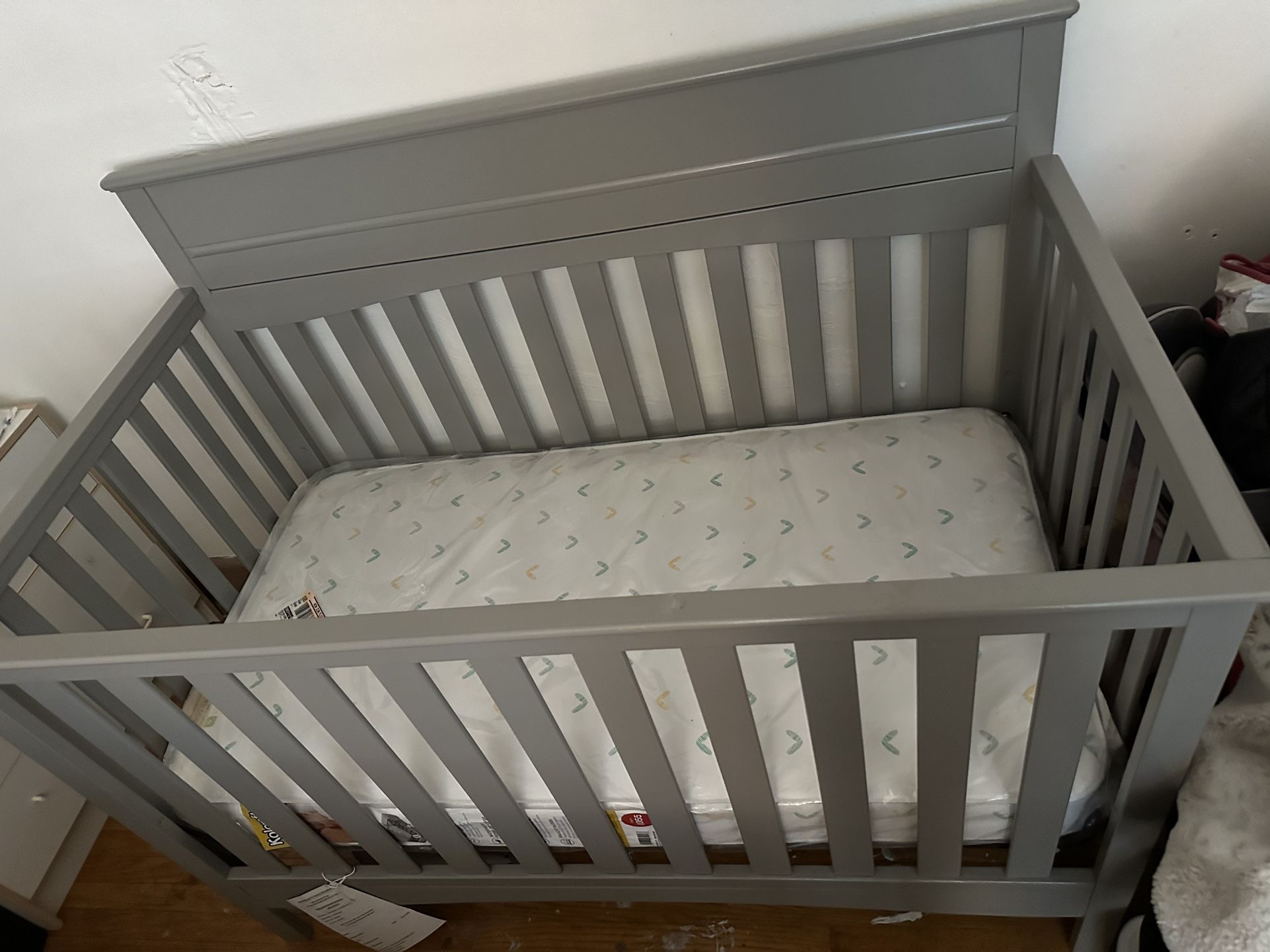 Gray crib (convertible)