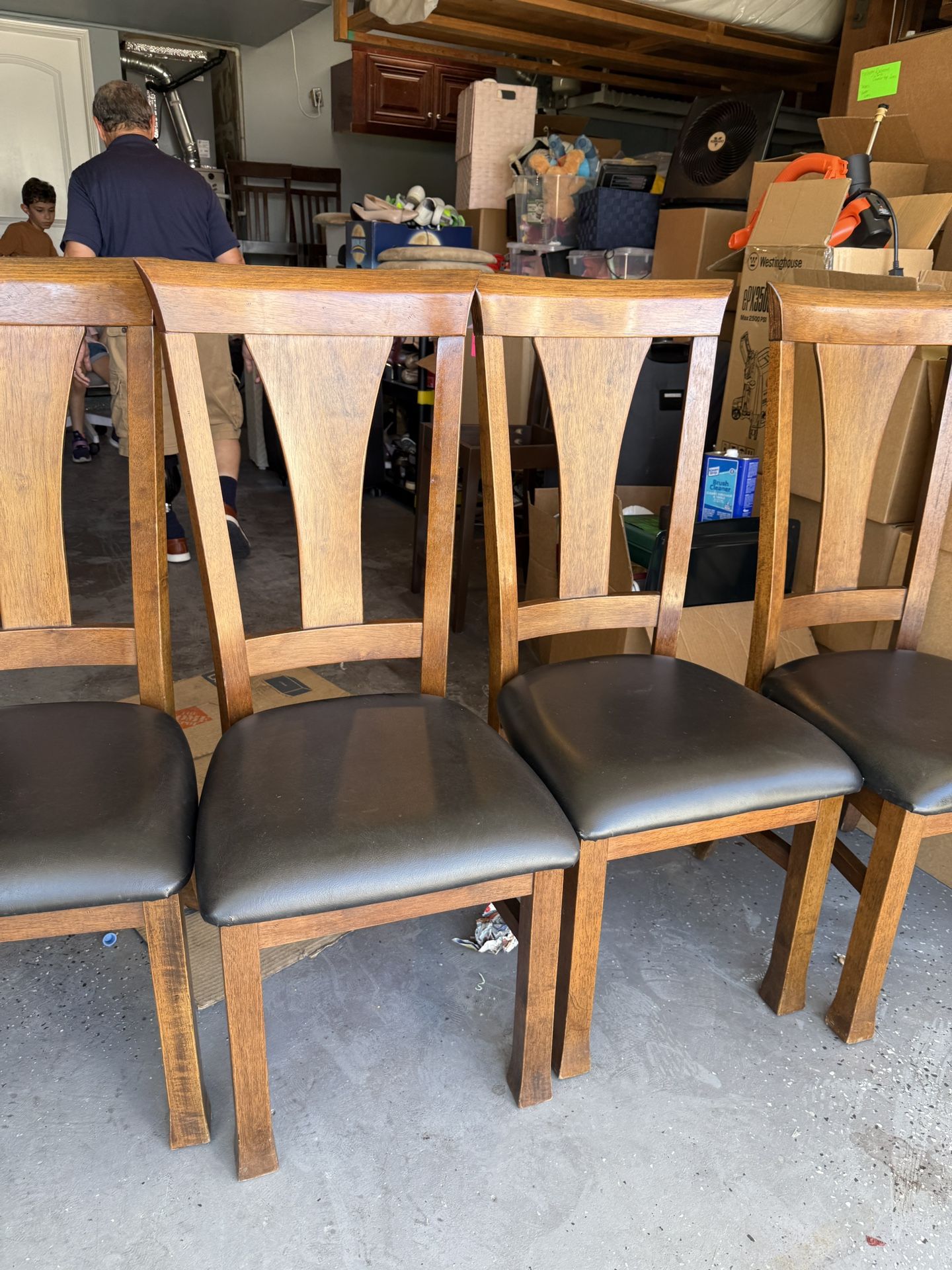 4. Chairs With Black Leather Set.