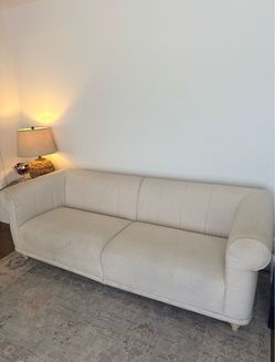 Cream Channel-Back Sofa with Rolled Arms