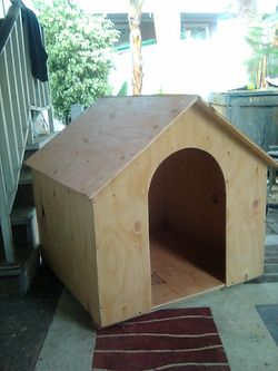New large wood dog house