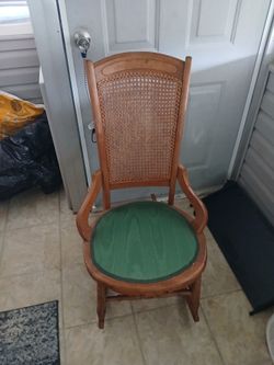 Vintage rocking chair with an extra cushion