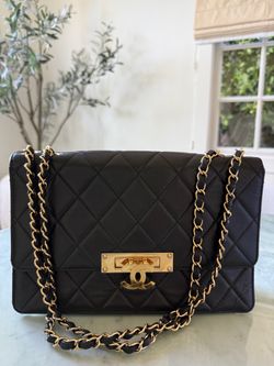 Chanel Quilted Black Leather Flap Bag