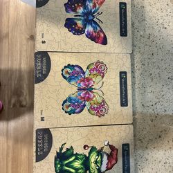3 wood puzzles