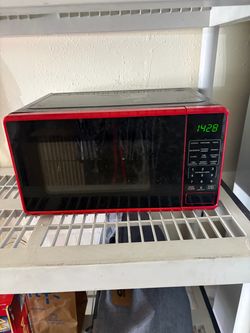 Small red microwave