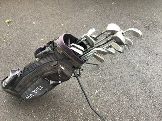 Maxfli Black Golf Stand Bag with Irons and two sets woods.