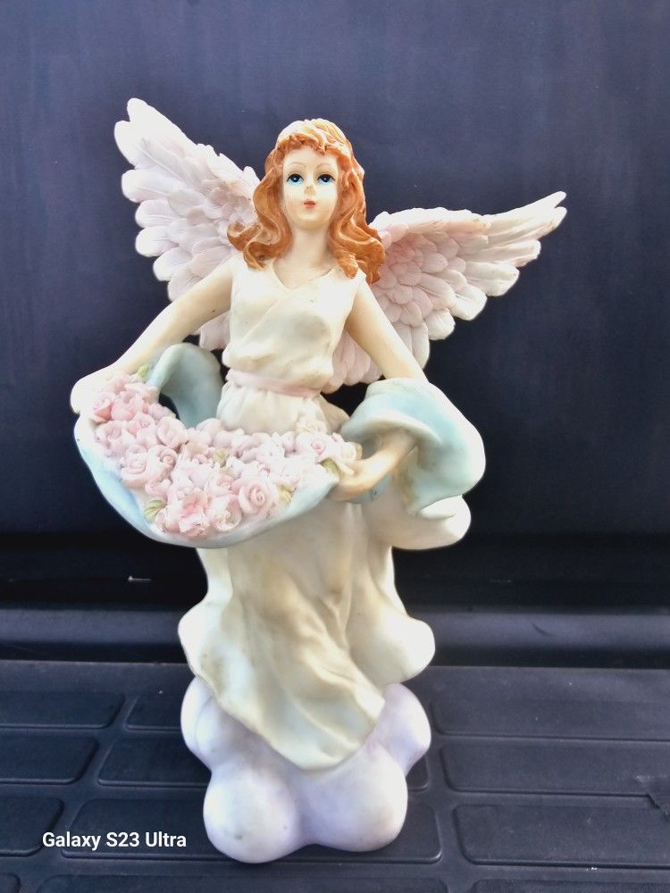 Angel Holding Roses On A Cloud